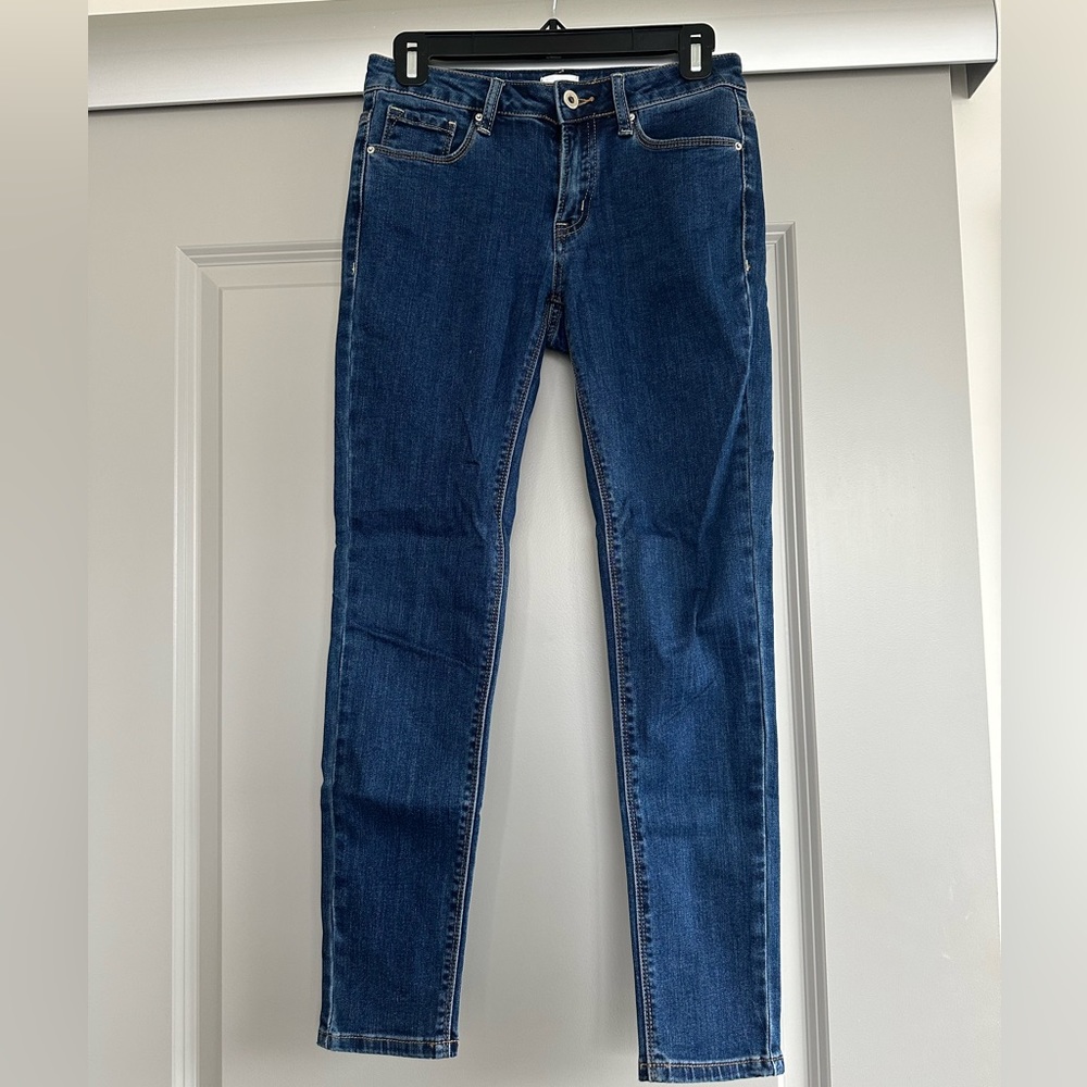 New Dark Blue Skinny Ankle Jeans- Size 3, which is = to a 25. Worn once.